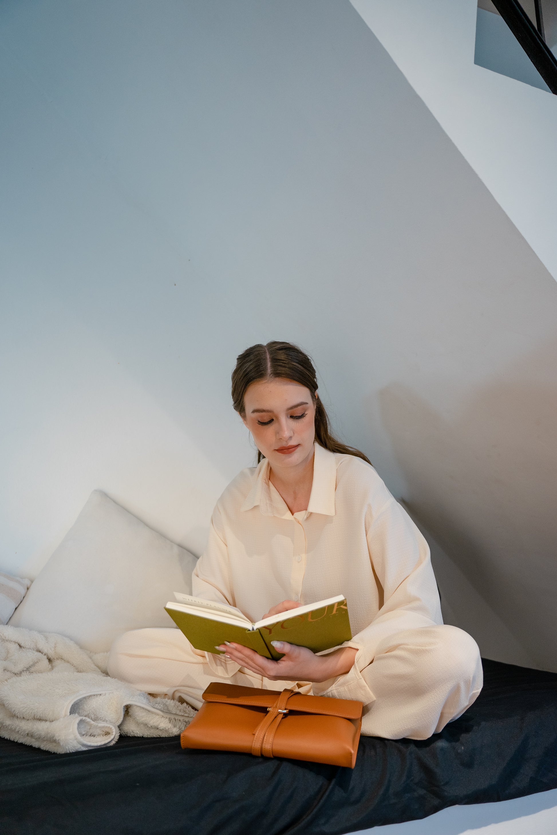 The Cloud Clutch in Tan