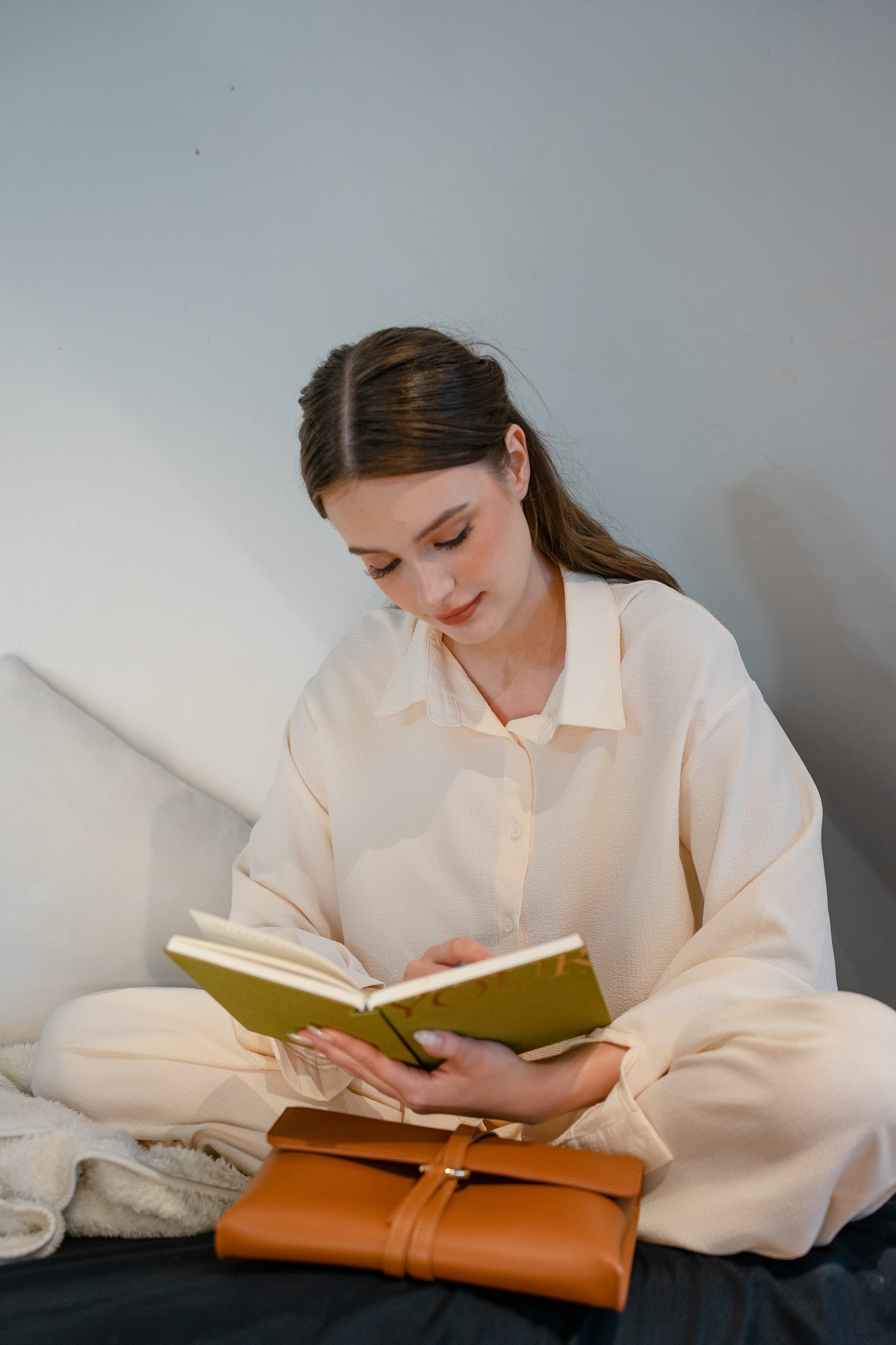 The Cloud Clutch in Tan